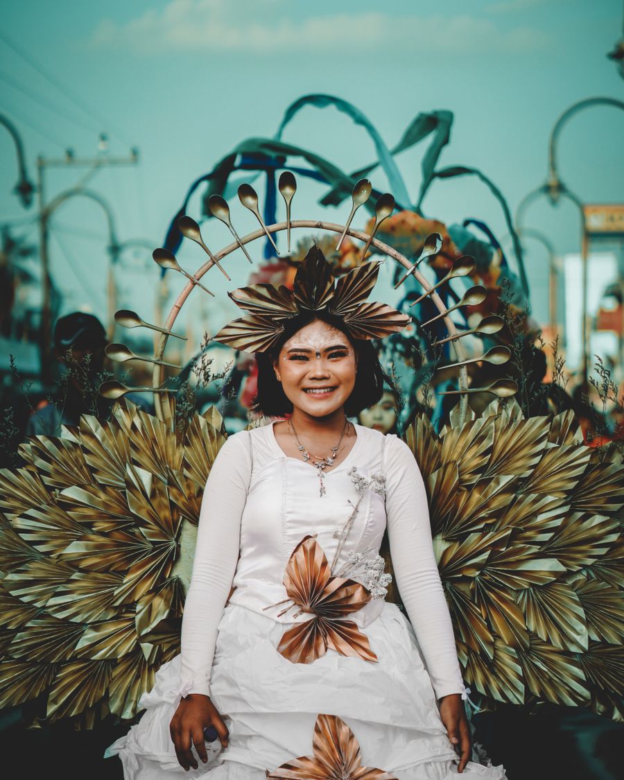 Carnival performer in an elaborate feathered costume
